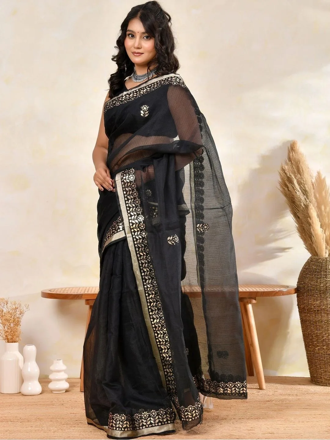 Black Kota Doria saree with embellished border — front drape