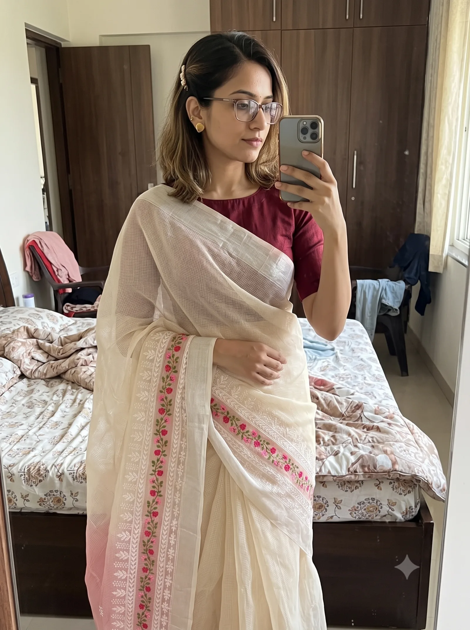 Customer wearing cream Kota Doria floral embroidered saree — mirror selfie at home