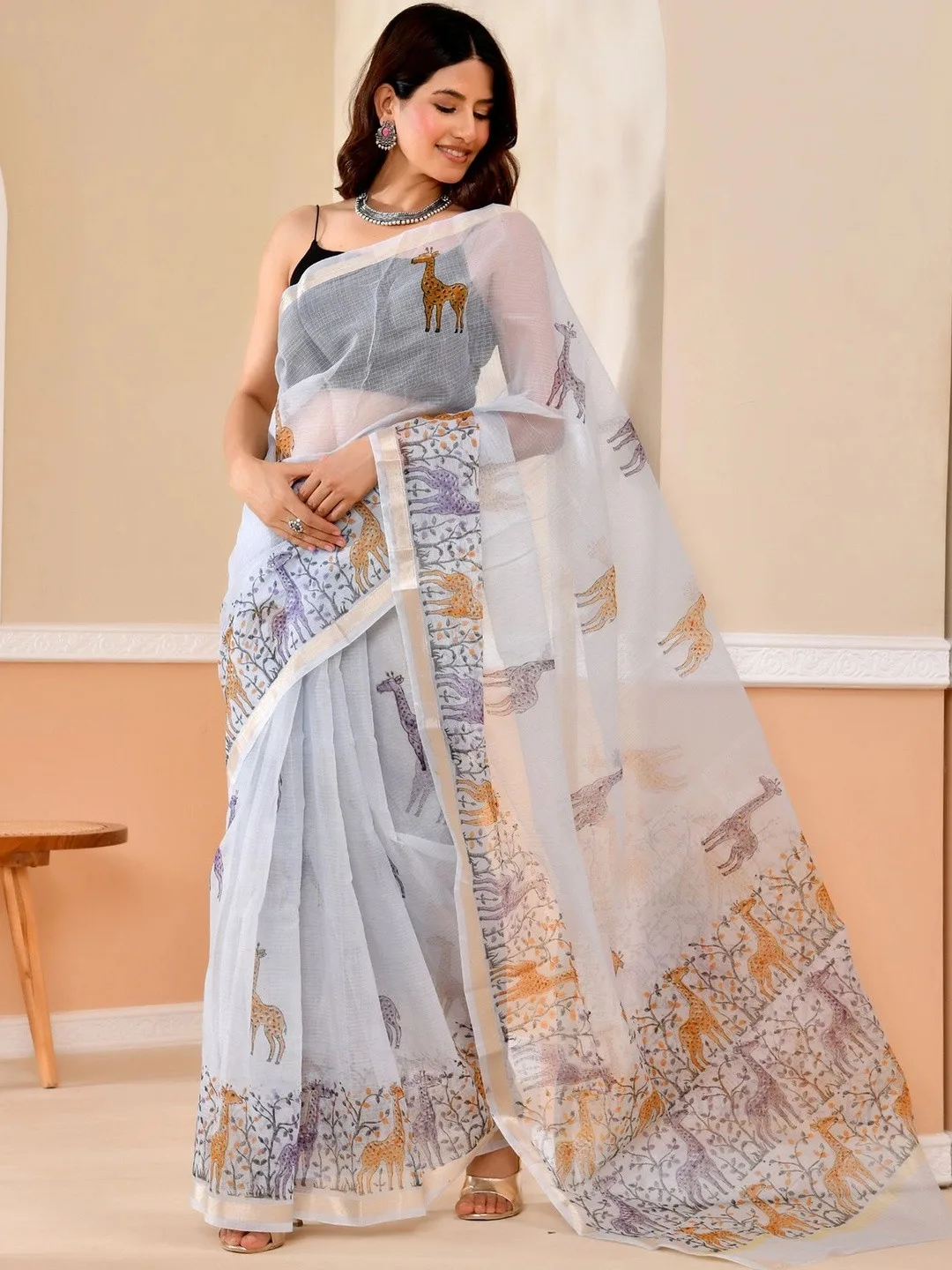 Ethnic printed motifs and woven border — detail