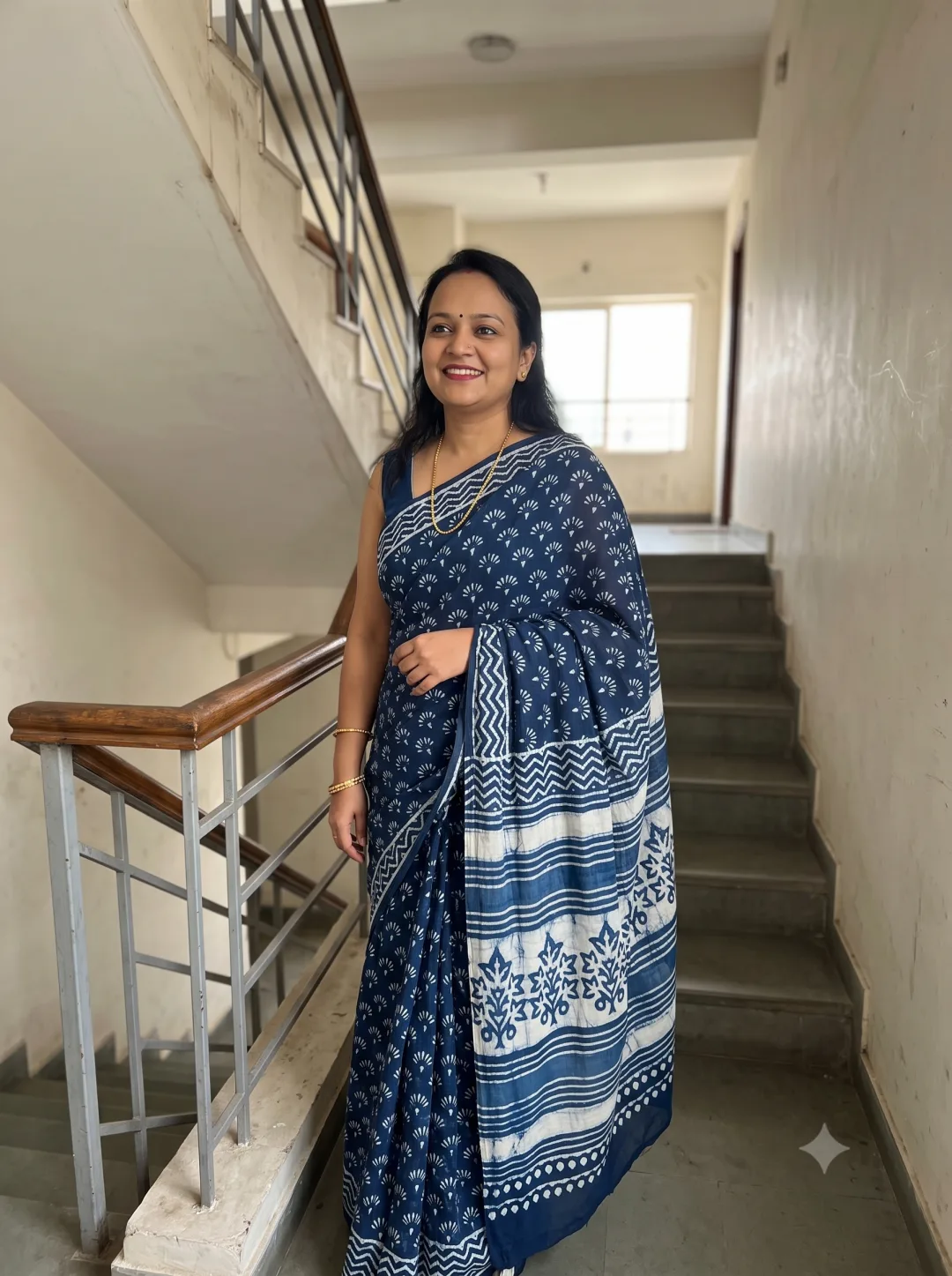Customer wearing Indigo Pure Cotton Ethnic Motifs Printed Saree