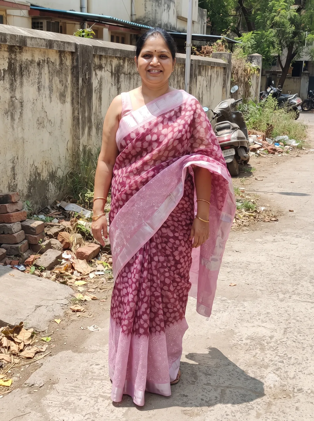 Customer wearing Pink Kota Doria Floral Embroidered Saree with Zari Border