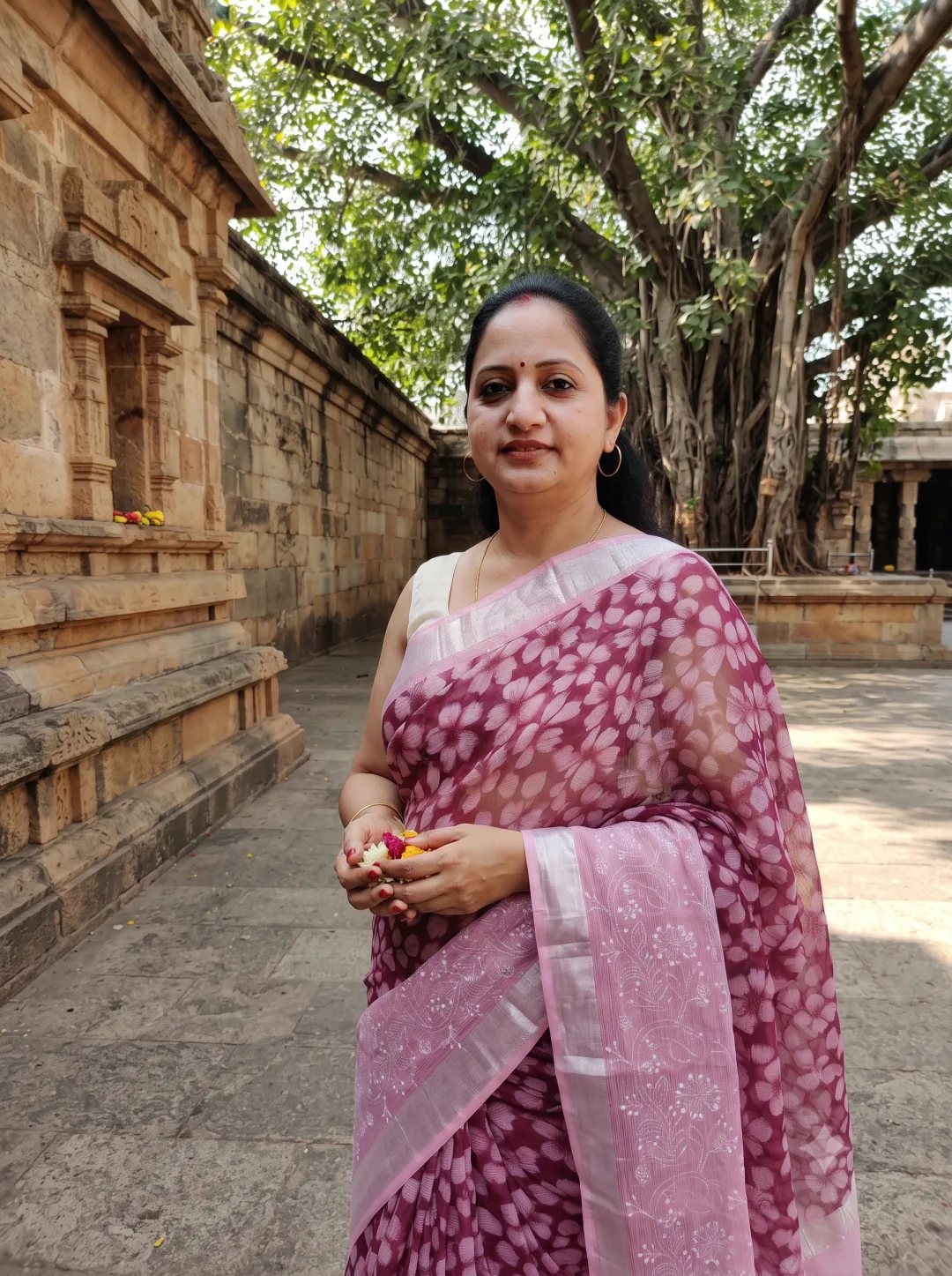 Customer wearing Pink Kota Doria Floral Embroidered Saree with Zari Border