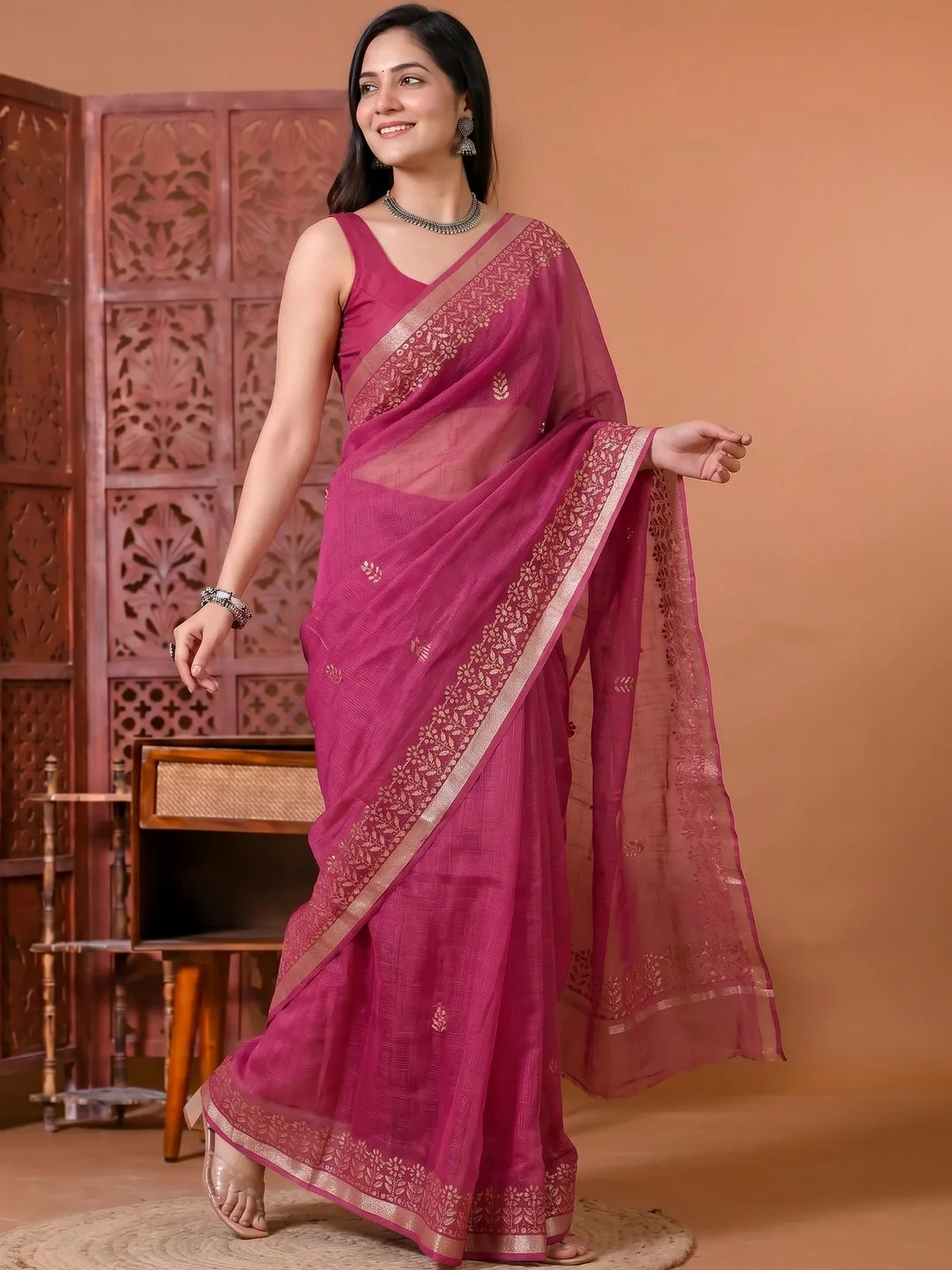 Pink Kota Doria saree with zari border — back view