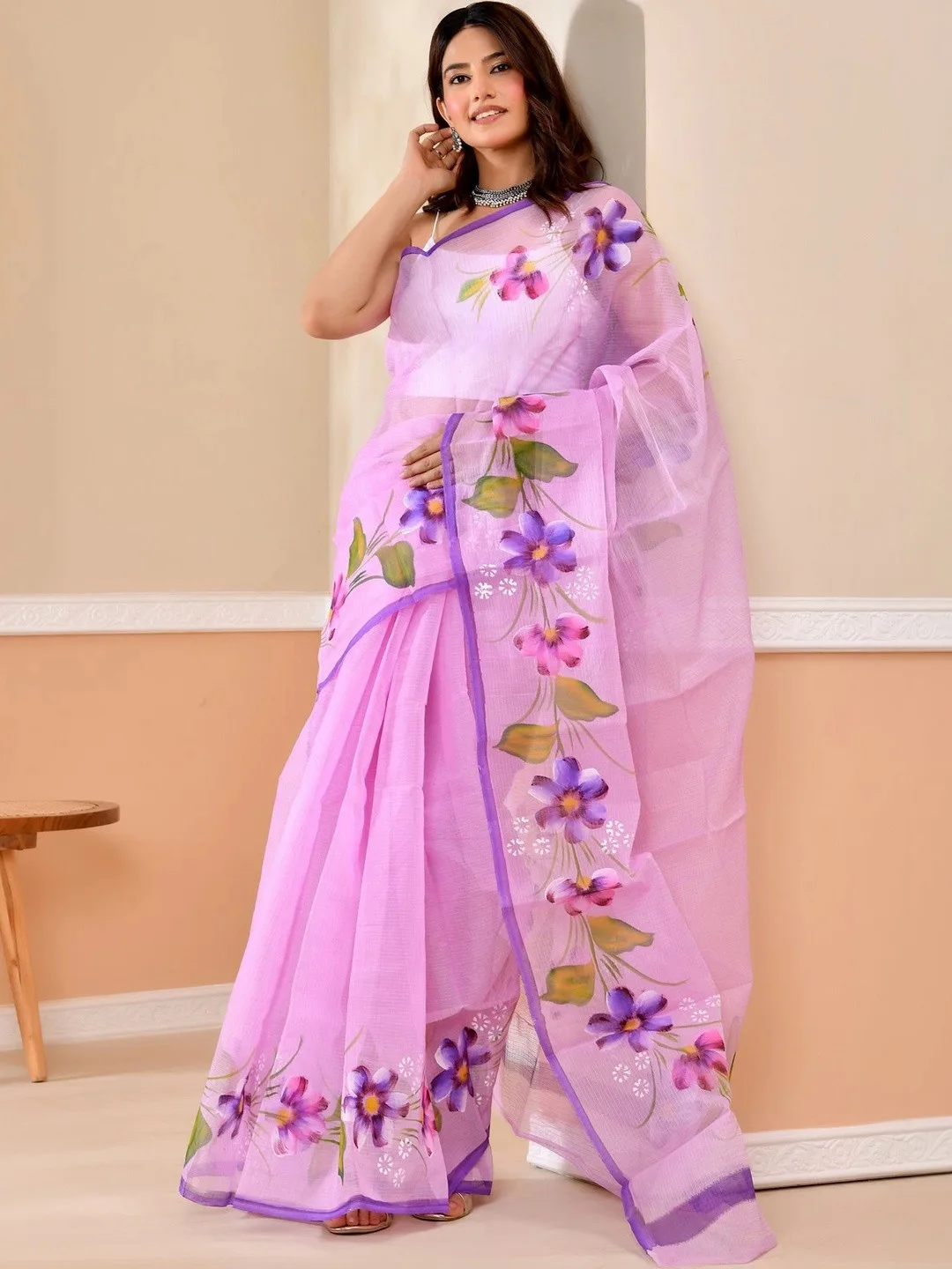 Floral print and printed border on purple Kota Doria — detail