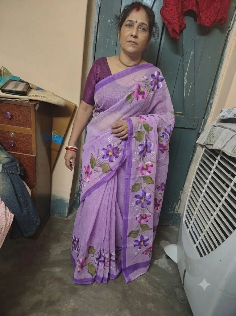 Customer wearing purple floral printed saree