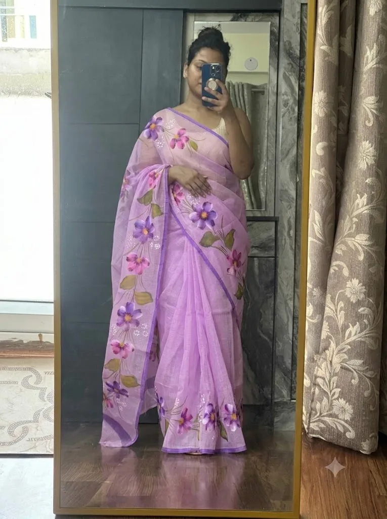 Customer wearing purple floral printed saree