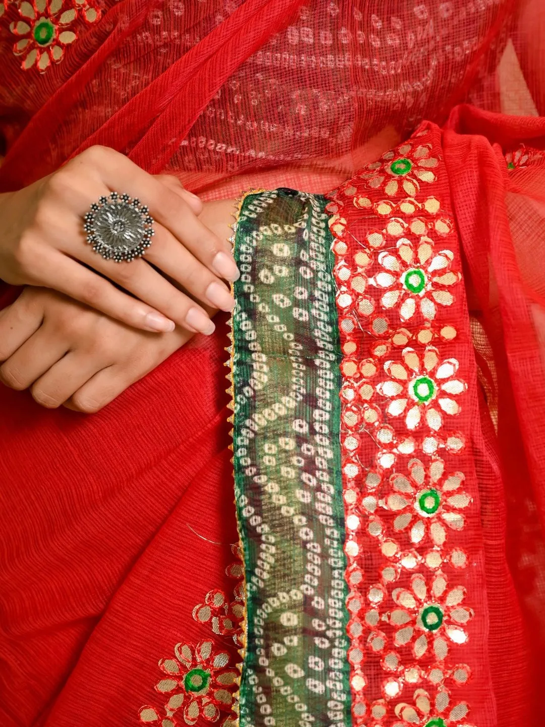 Red Kota Doria saree with green bandhani border — back view