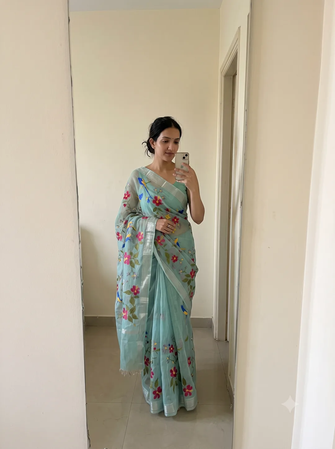 Customer wearing Sea Green Kota Doria Floral Embroidered Saree