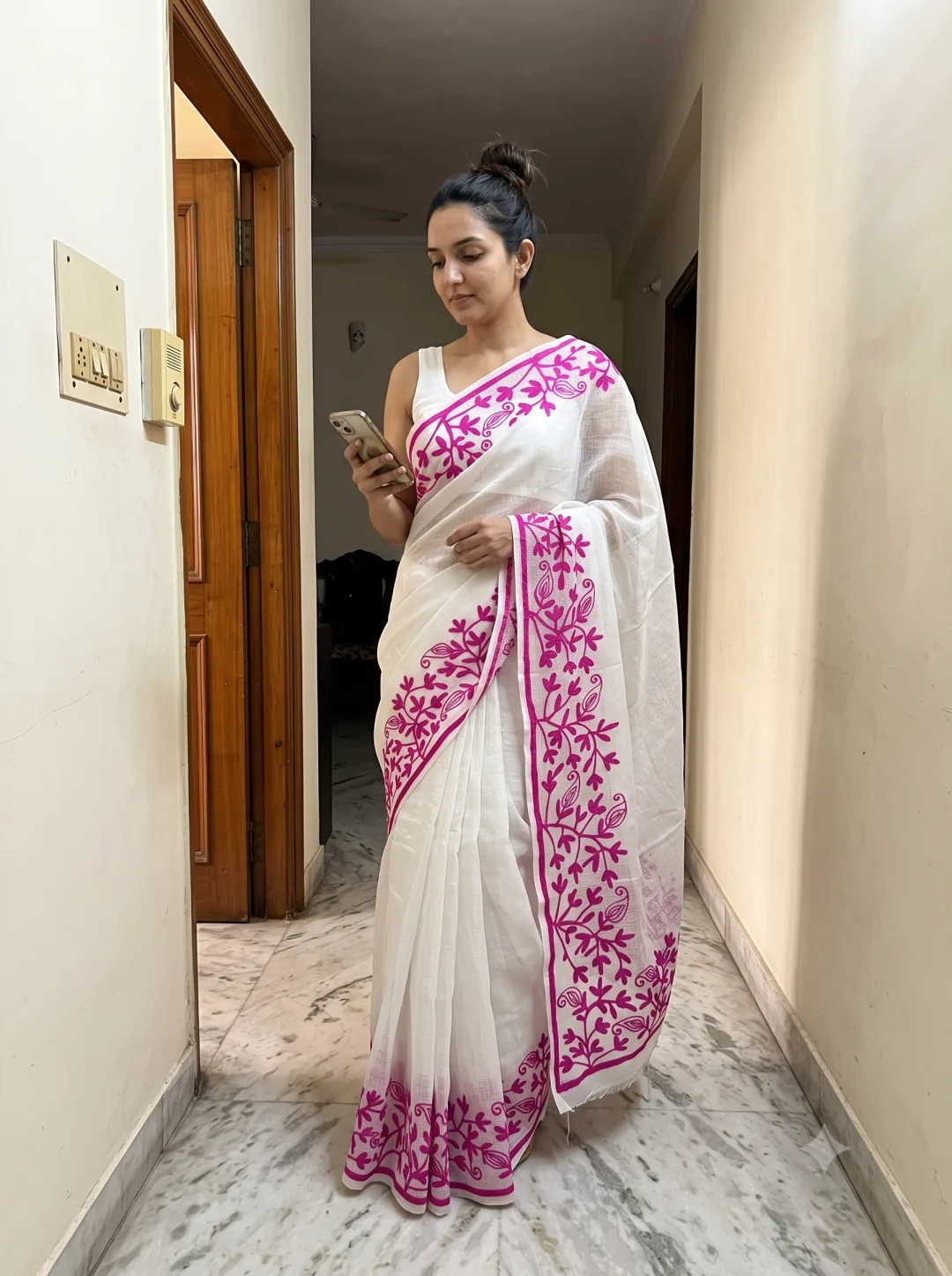 Customer wearing White Kota Doria Ethnic Motifs Embroidered Saree