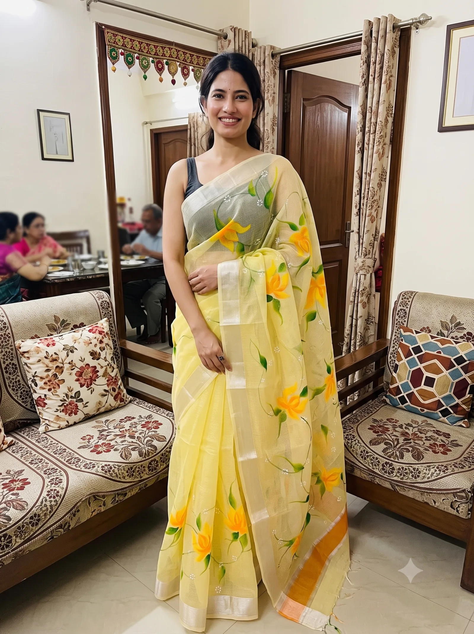 Customer wearing yellow Kota Doria floral printed saree at puja