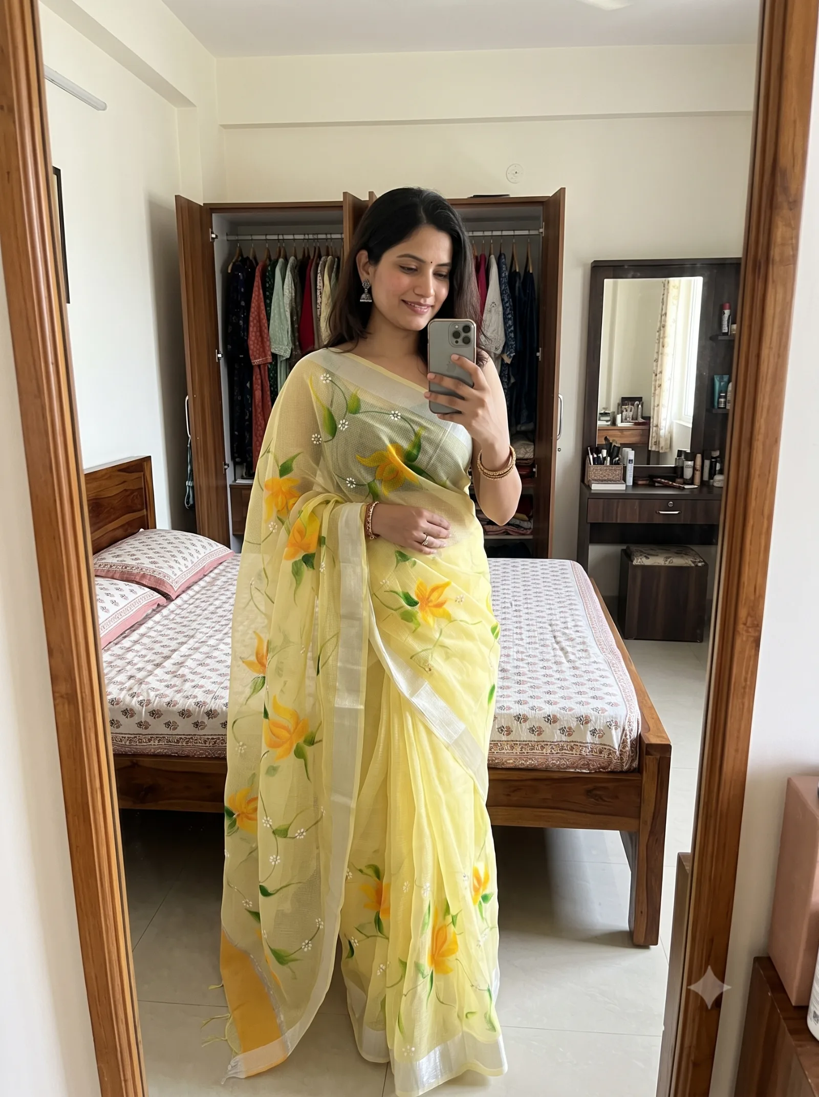 Customer wearing yellow Kota Doria floral printed saree at home